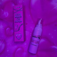 Shampoo bottle and box on a purple heart-patterned background